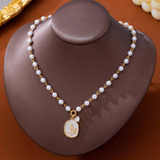 Gold Pearl Chain Floral Pendant Necklace