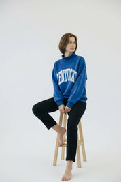 Blue Kentucky Reversible Mockneck showing drop shoulder