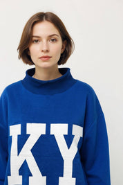 Blue Kentucky Reversible Mockneck in a oversized