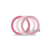 Spiral Hair Coils | Small | Made Me Blush showing strong grip, no rip spiral hair tie
