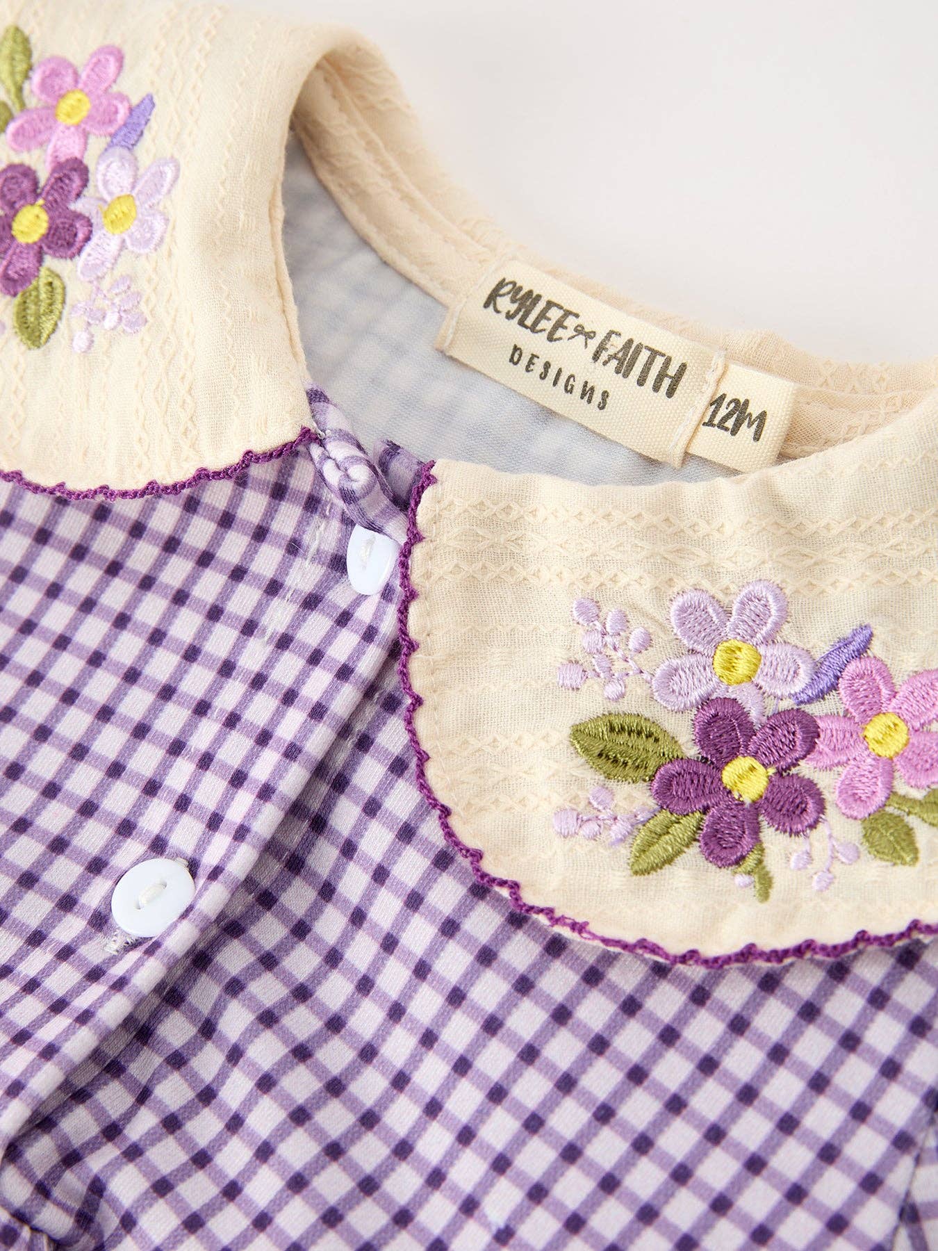 Purple Plaid Floral Bubble Romper showing long sleeves