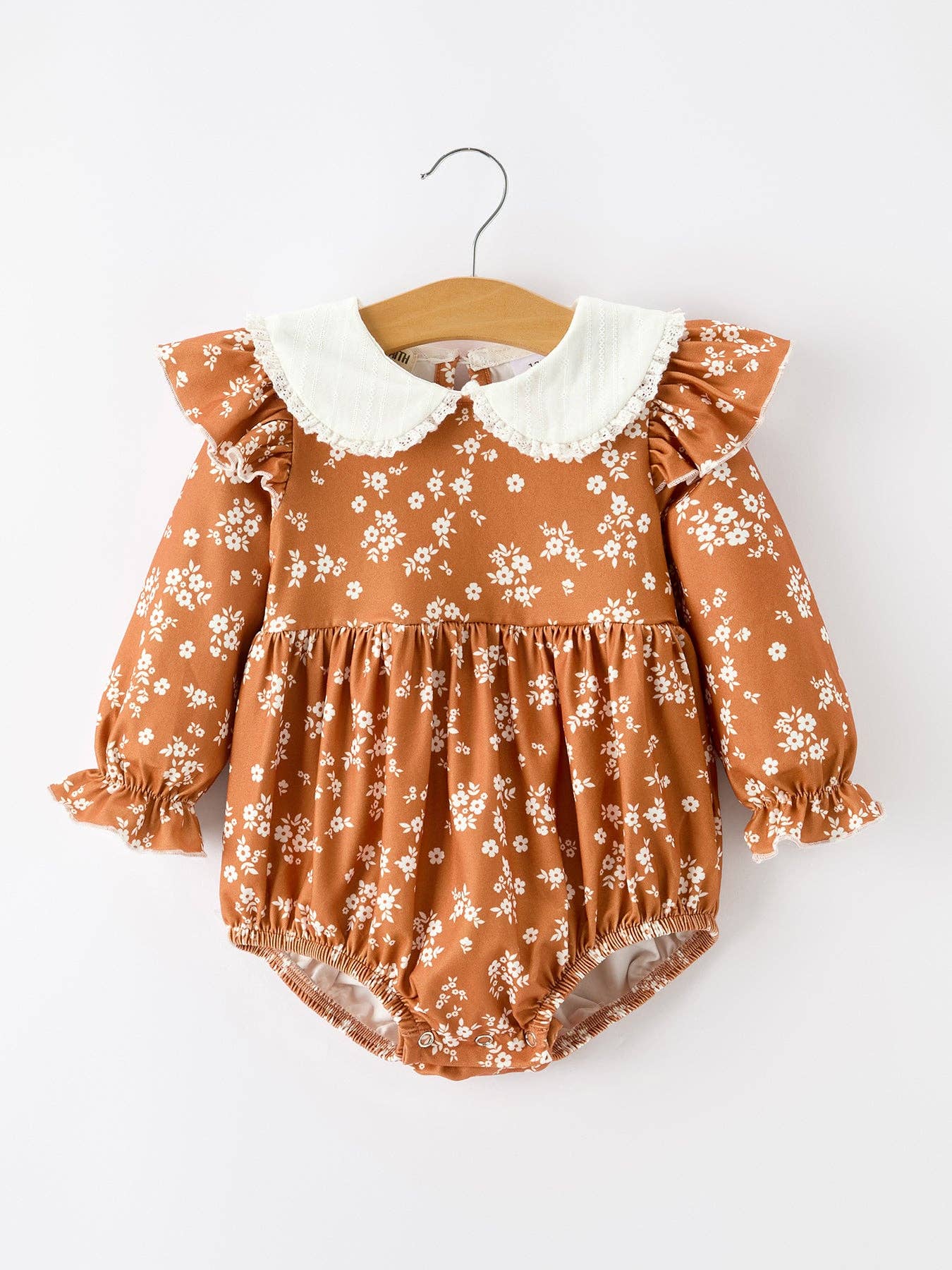 Rust Floral Bubble Romper — dainty lace trim and shoulder ruffles