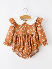 Rust Floral Bubble Romper — dainty lace trim and shoulder ruffles