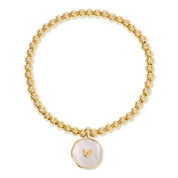 Heart Accented Shell Charm Stretch Bracelet — stretch bracelet and 4mm beads