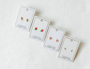 Stud Earrings Clara Cross Gold Sparkle