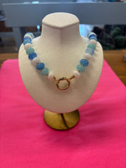 Blue Stone Charm Necklace — blue shades colorful beads and prominent gold-plated clasp in front
