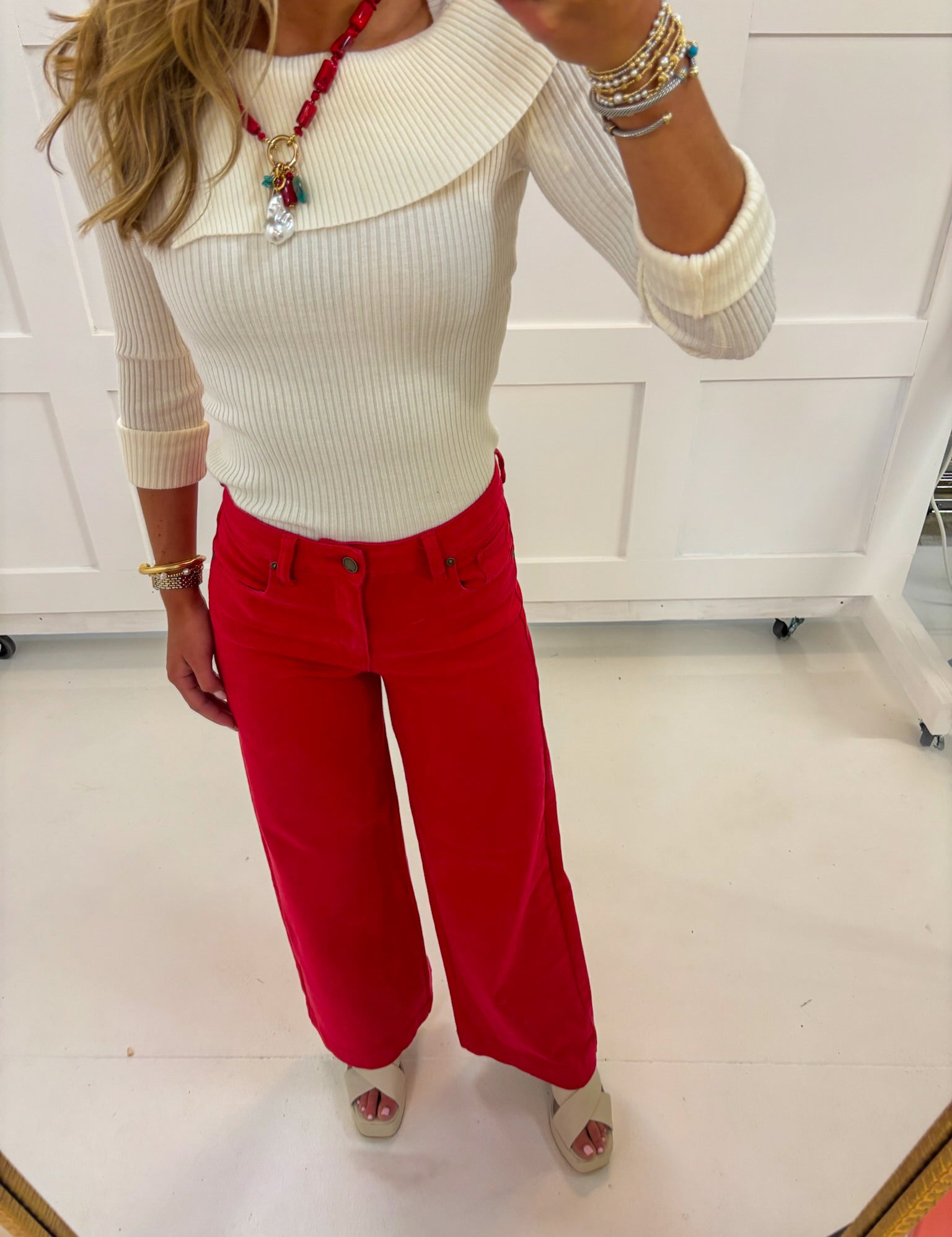 Bold red wide leg jeans in a stretch cotton denim blend