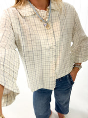 Light Blue Plaid Ruffle Top — checkered and ruffle collar