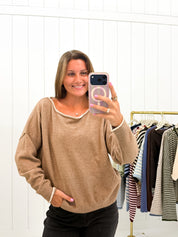 Brown Off the Shoulder Sweater showing color: taupe brown with ivory contrast trim