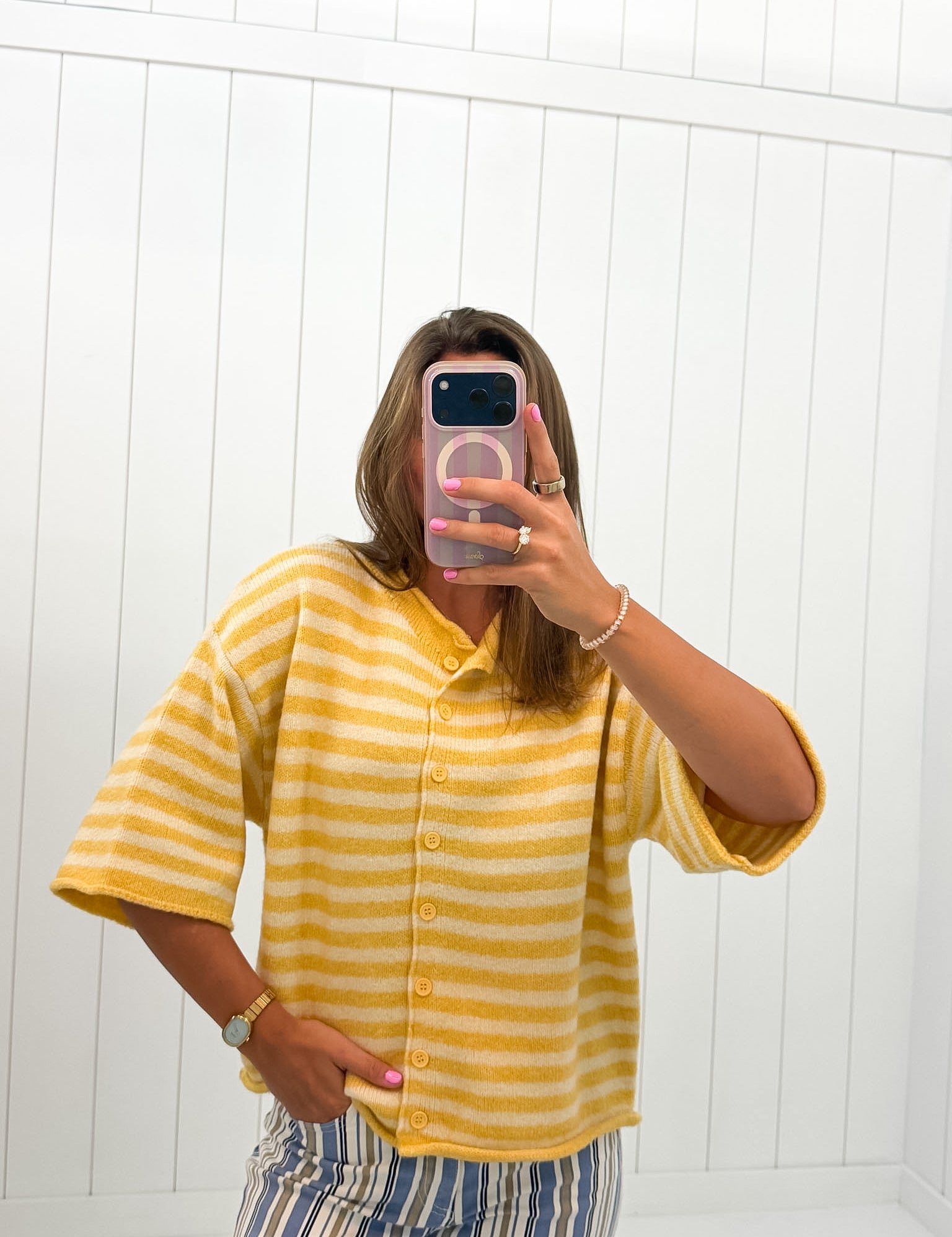 Yellow Stripe Quarter Sleeve Cardigan showing knit sweater