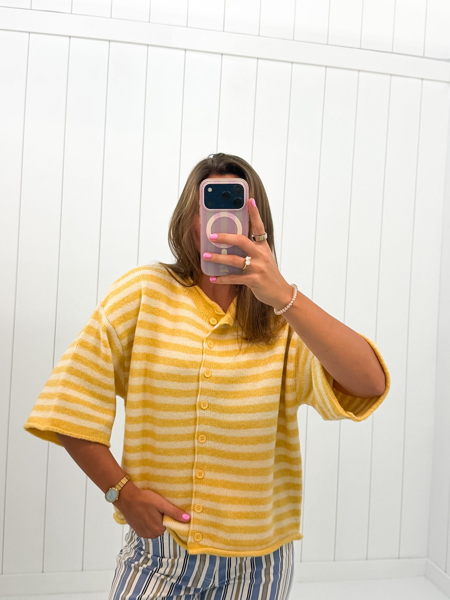 Yellow Stripe Quarter Sleeve Cardigan showing knit sweater