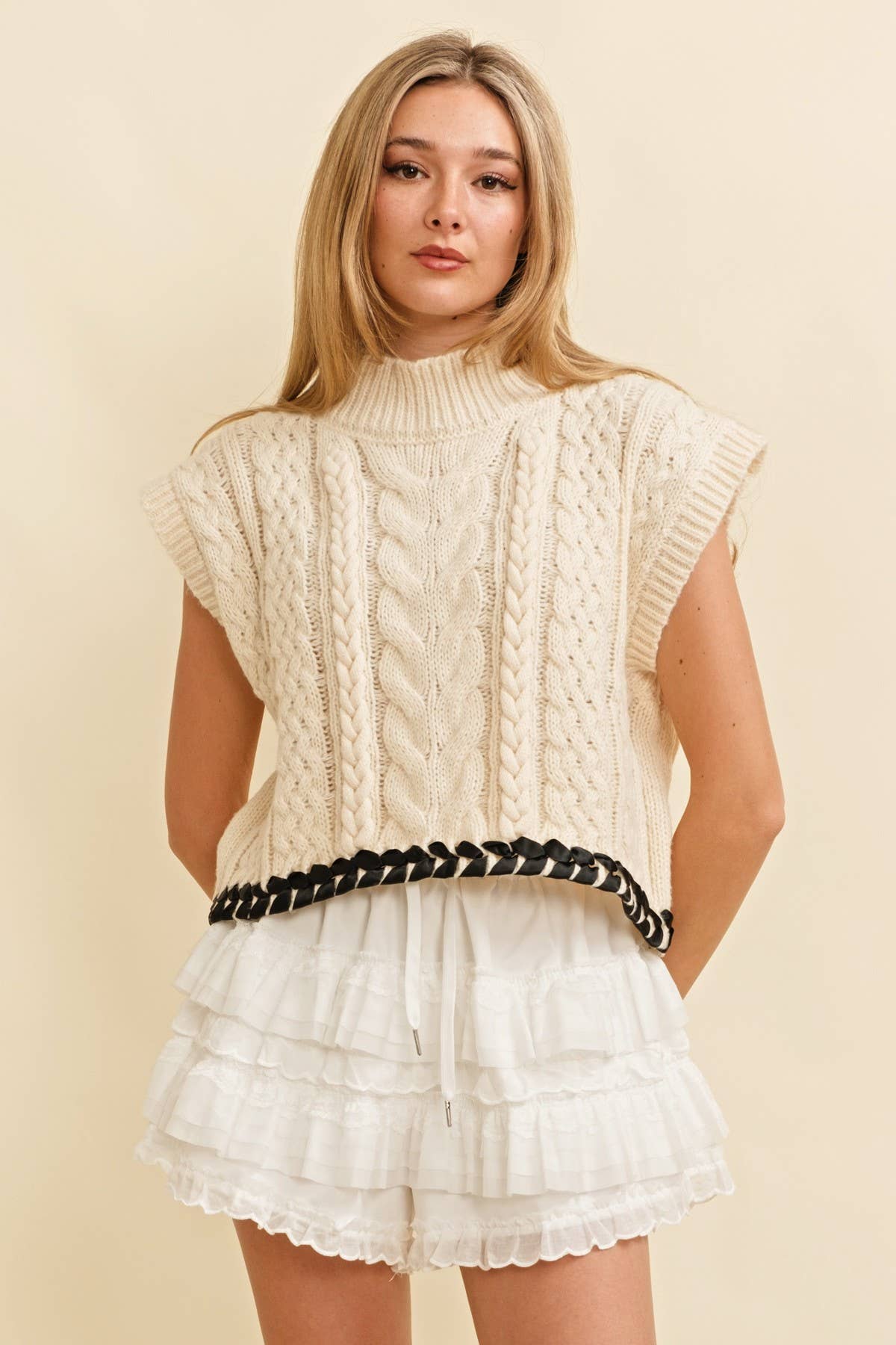 Cream Cable Knit Sweater Vest — color: cream and mock neckline