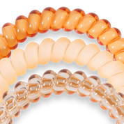 Spiral Hair Coils | Small | Peach Fuzz showing doubles as a bracelet