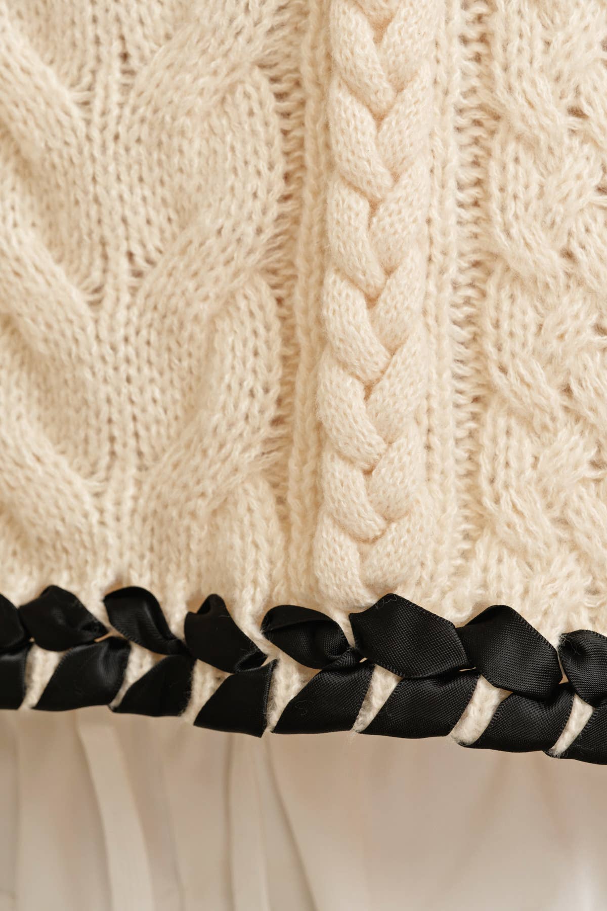 Cream Cable Knit Sweater Vest showing mock neckline