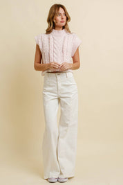 Light Pink Cable Knit Sweater Vest showing sleeveless with drop shoulders