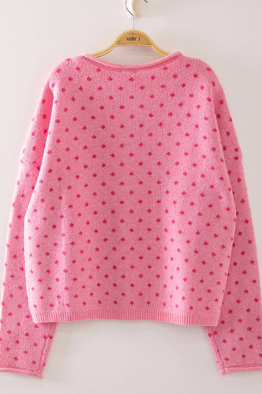Pink Polka Dot Sweater showing round neckline