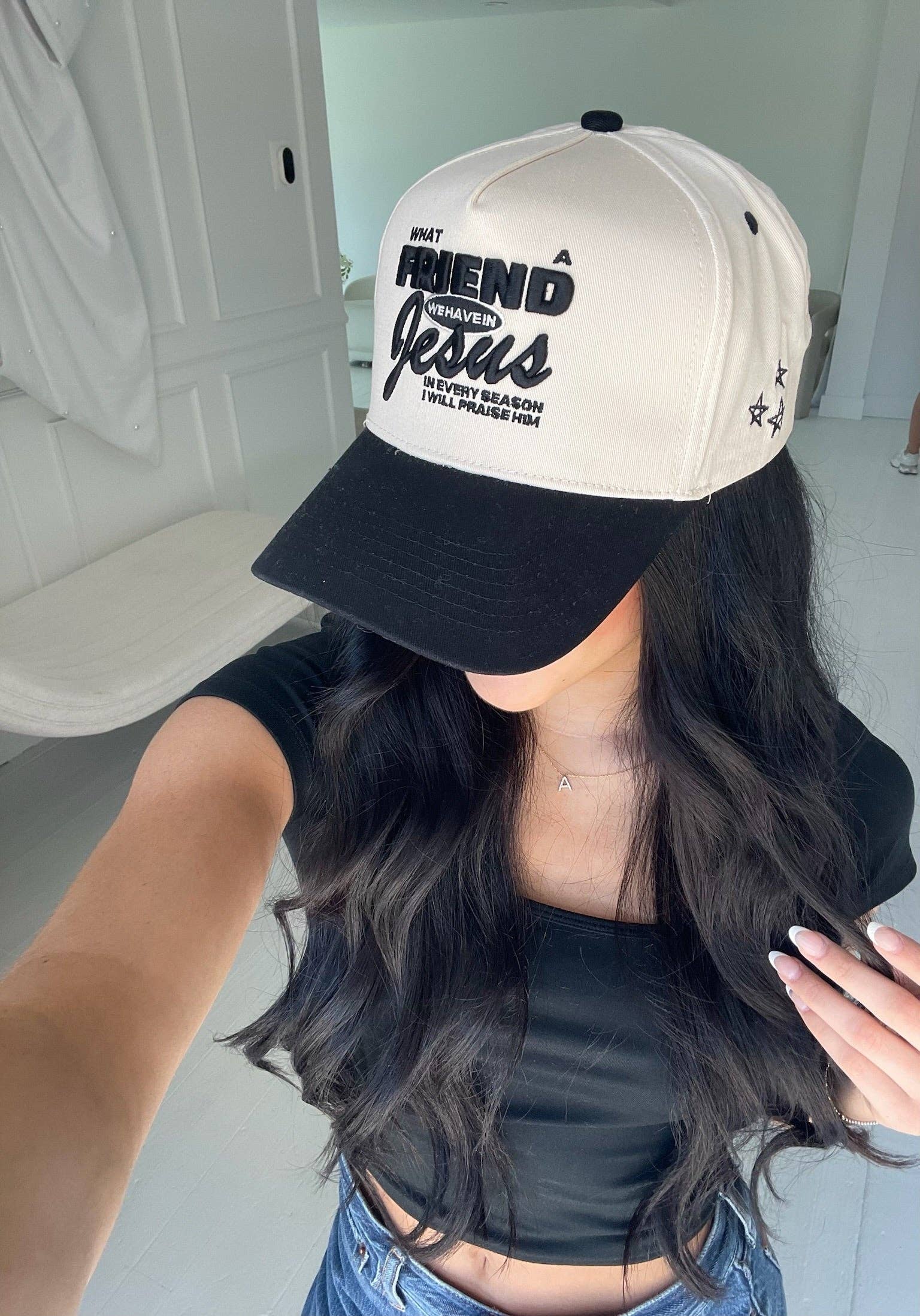 Black Friend in Jesus Trucker Hat