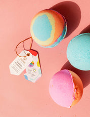 Rainbow Connection Bath Balm showing surprise rainbow bracelet inside
