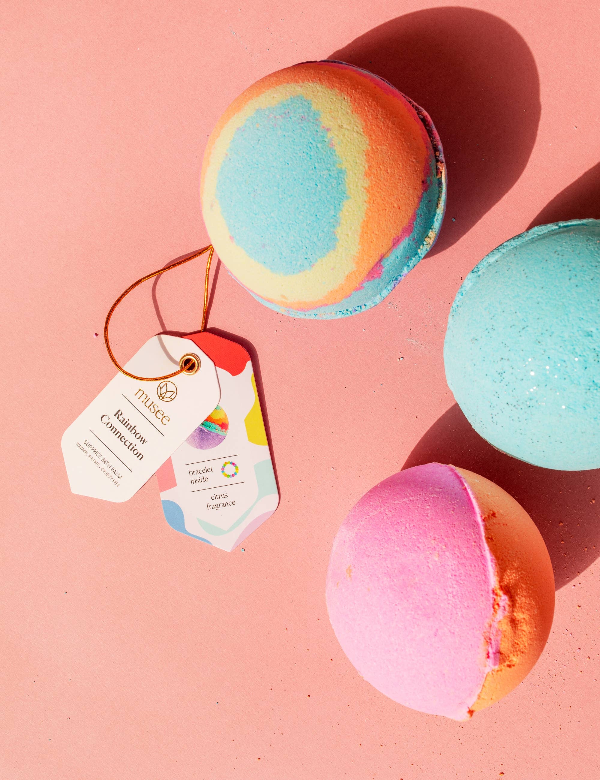 Rainbow Connection Bath Balm showing surprise rainbow bracelet inside