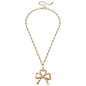 Greyson Bow Pendant Necklace in Worn Gold