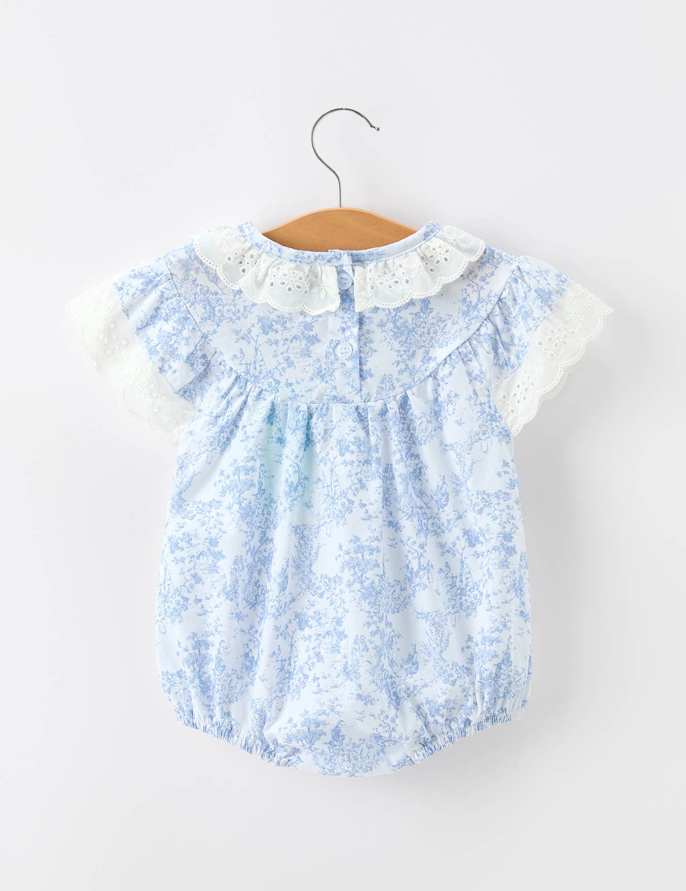 Blue Floral Smocked Matching Set Baby Romper showing delicate blue floral print on soft lightweight fabric