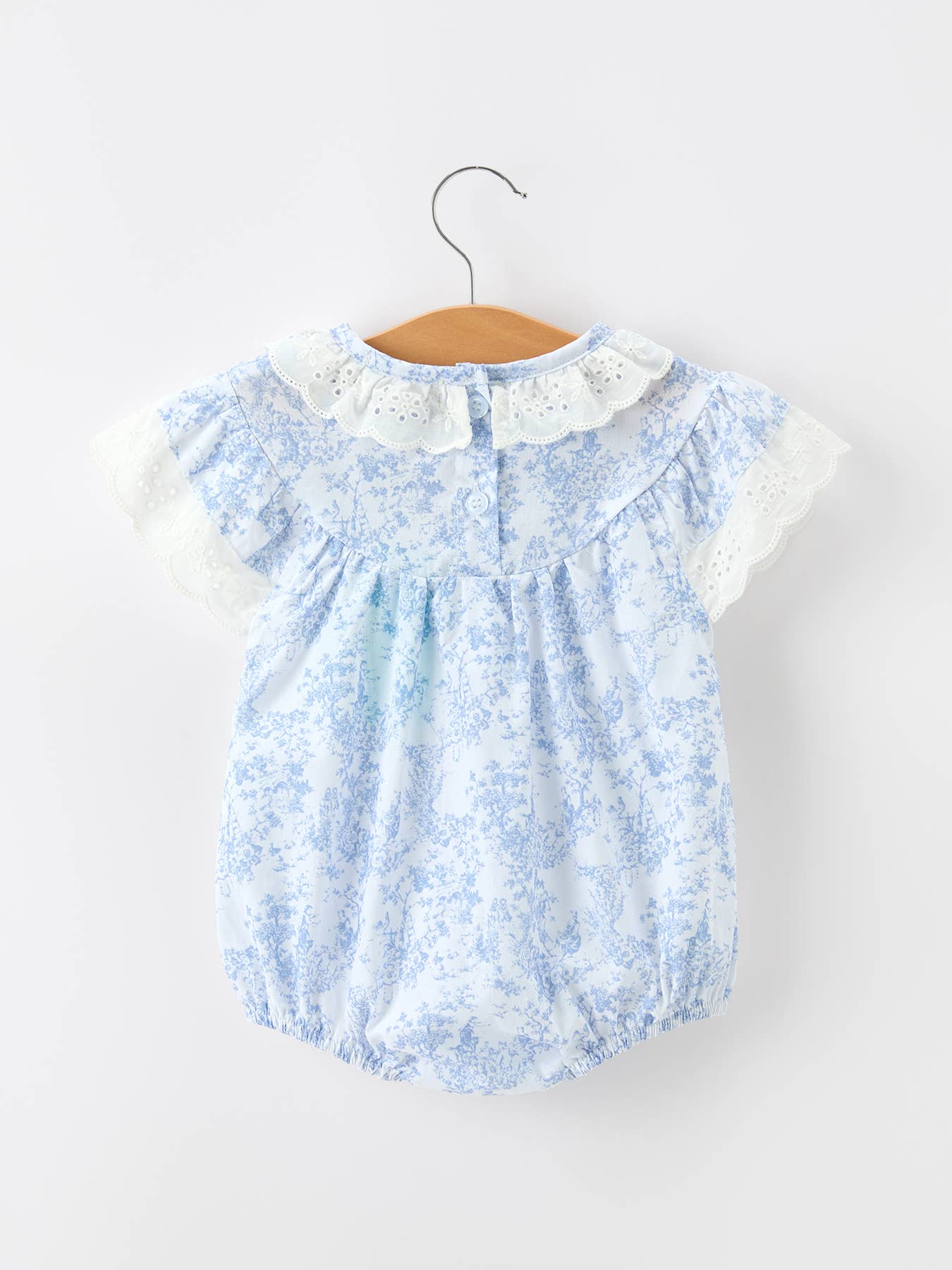 Blue Floral Smocked Matching Set Baby Romper showing delicate blue floral print on soft lightweight fabric
