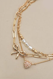 CHARM BRACELET-MULTI LAYER BOW PERAL HEART CHARMS | 80B1317