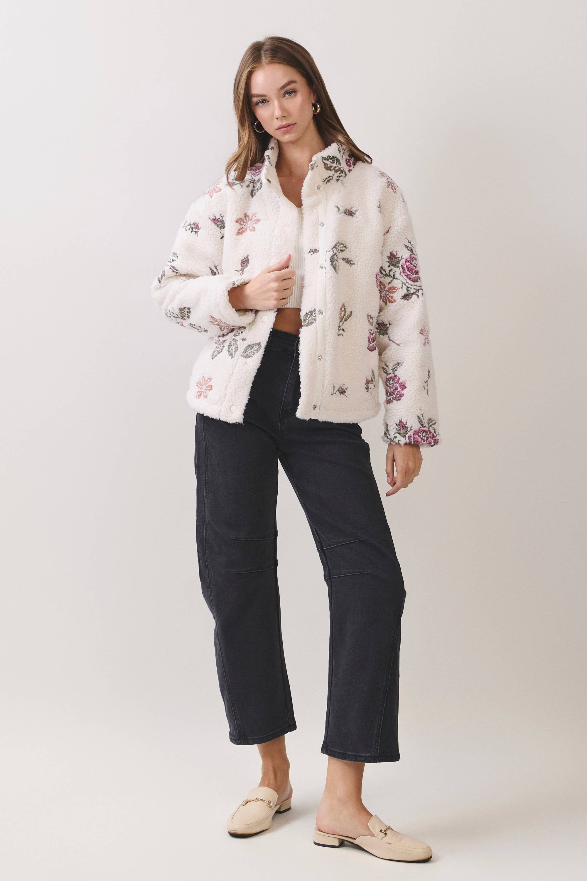 Cream Floral Embroidered Sherpa Jacket showing functional snap buttons down front