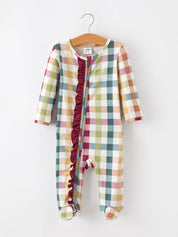 Plaid Ruffle Footie Pajamas — ruffle detail along the front and long sleeves