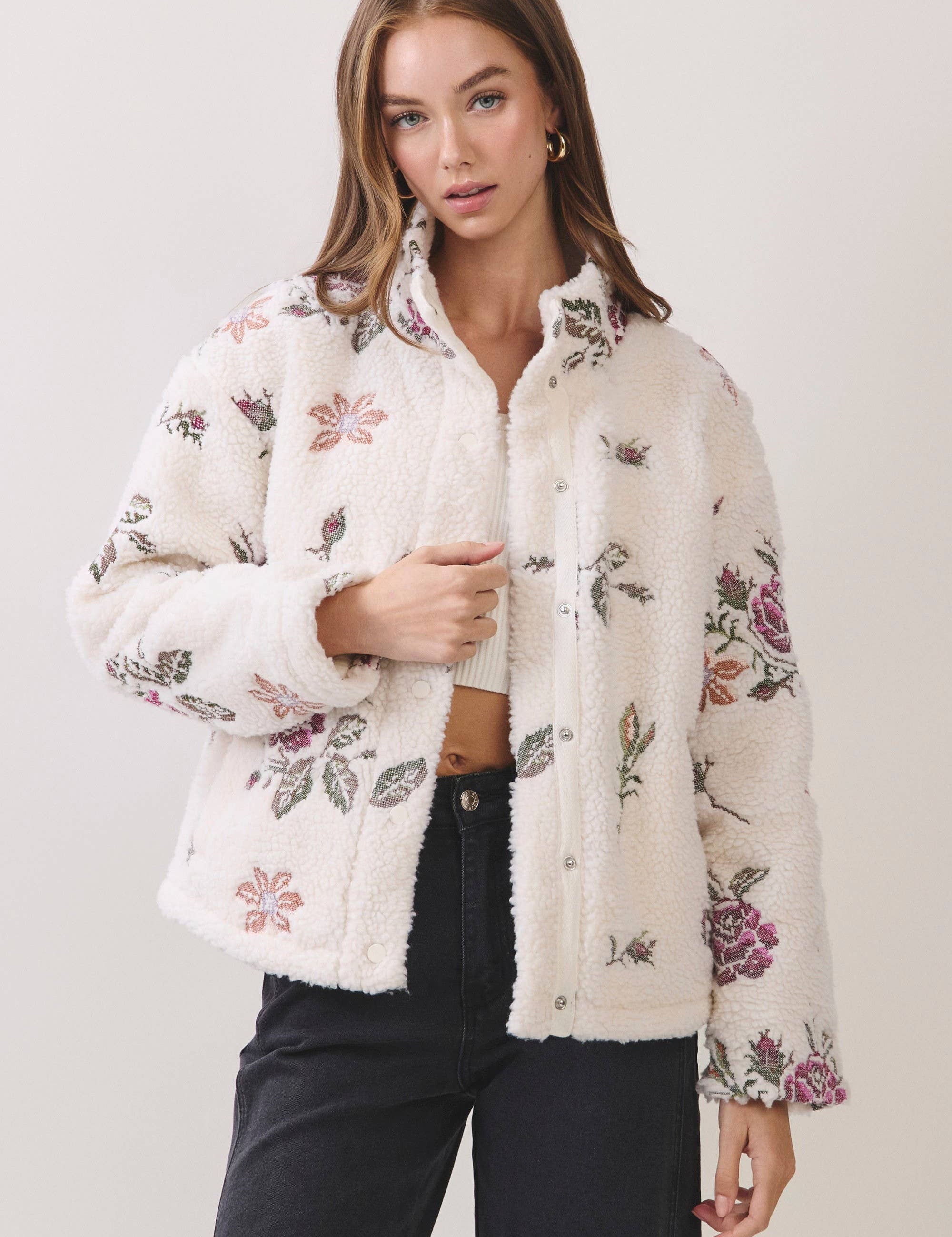 Cream Floral Embroidered Sherpa Jacket — plush sherpa texture and embroidered floral detailing throughout, front and back