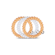 Spiral Hair Coils | Large | University of Tennessee showing strong grip, no rip spiral hair tie