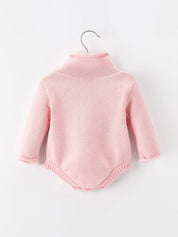 Christmas Candy Cane Romper showing delicate bow detail