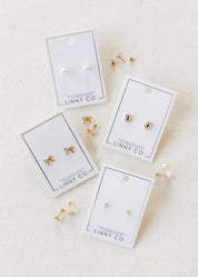 Stud Earrings Clara Cross Gold Sparkle