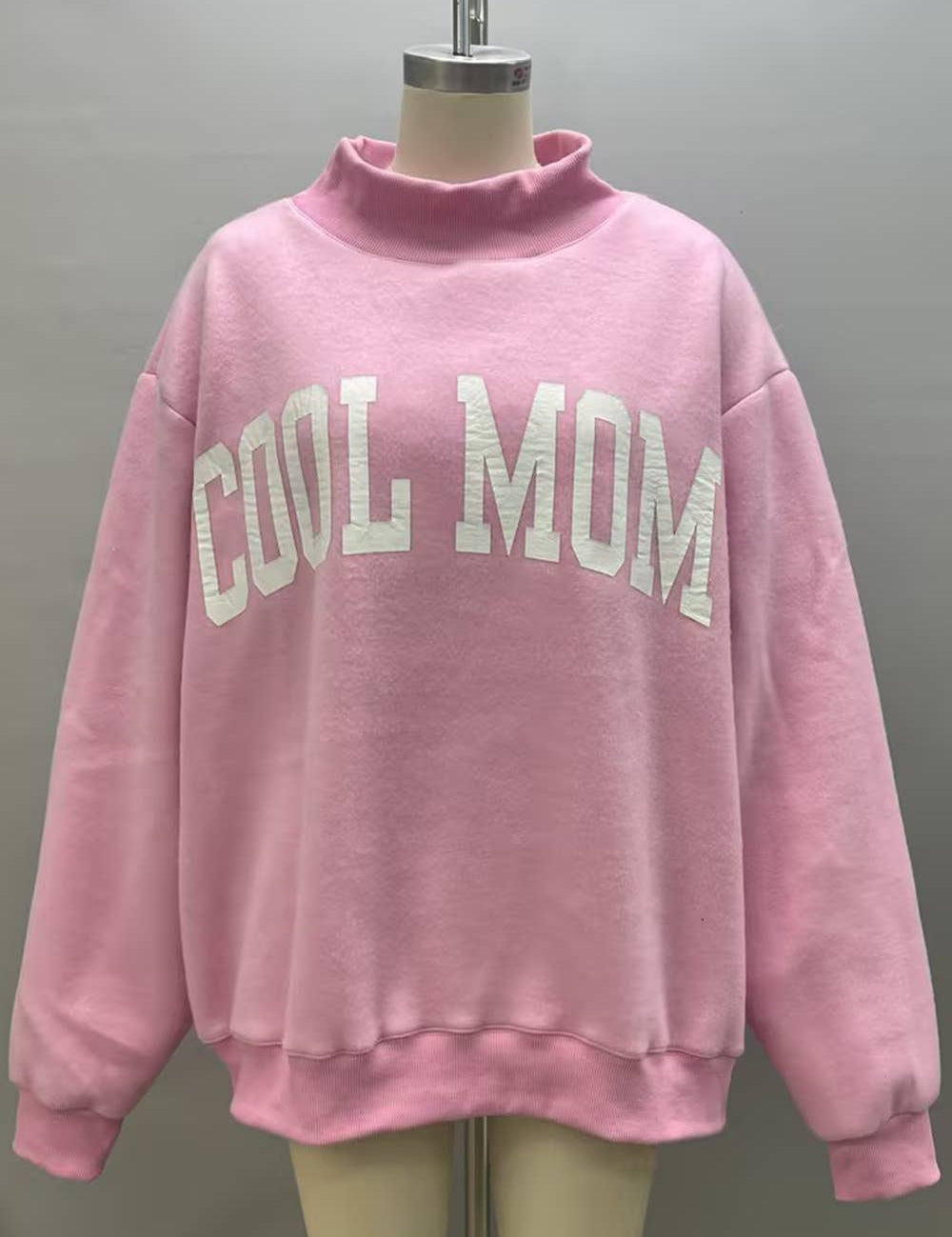Pink Mother Reversible Mock Neck showing mock neckline