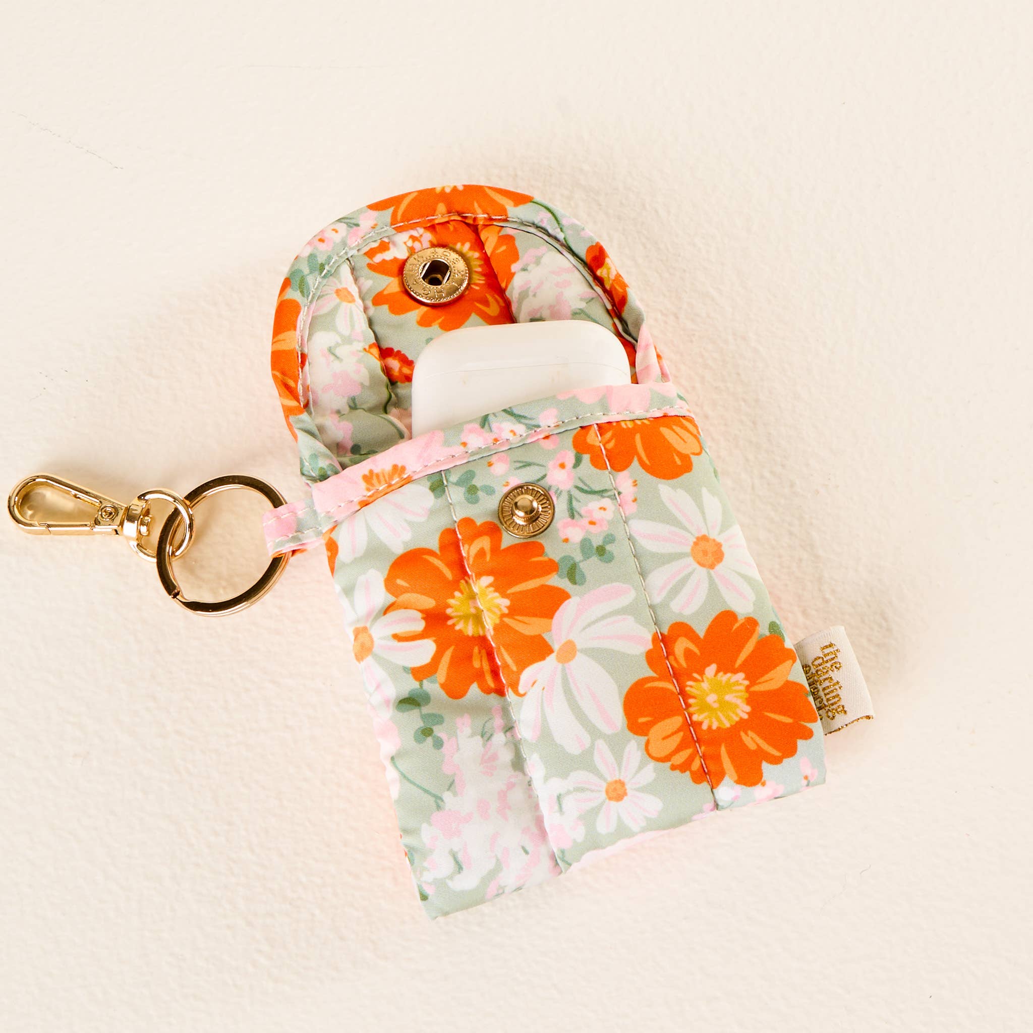 Orange Floral Earbud Case Keychain