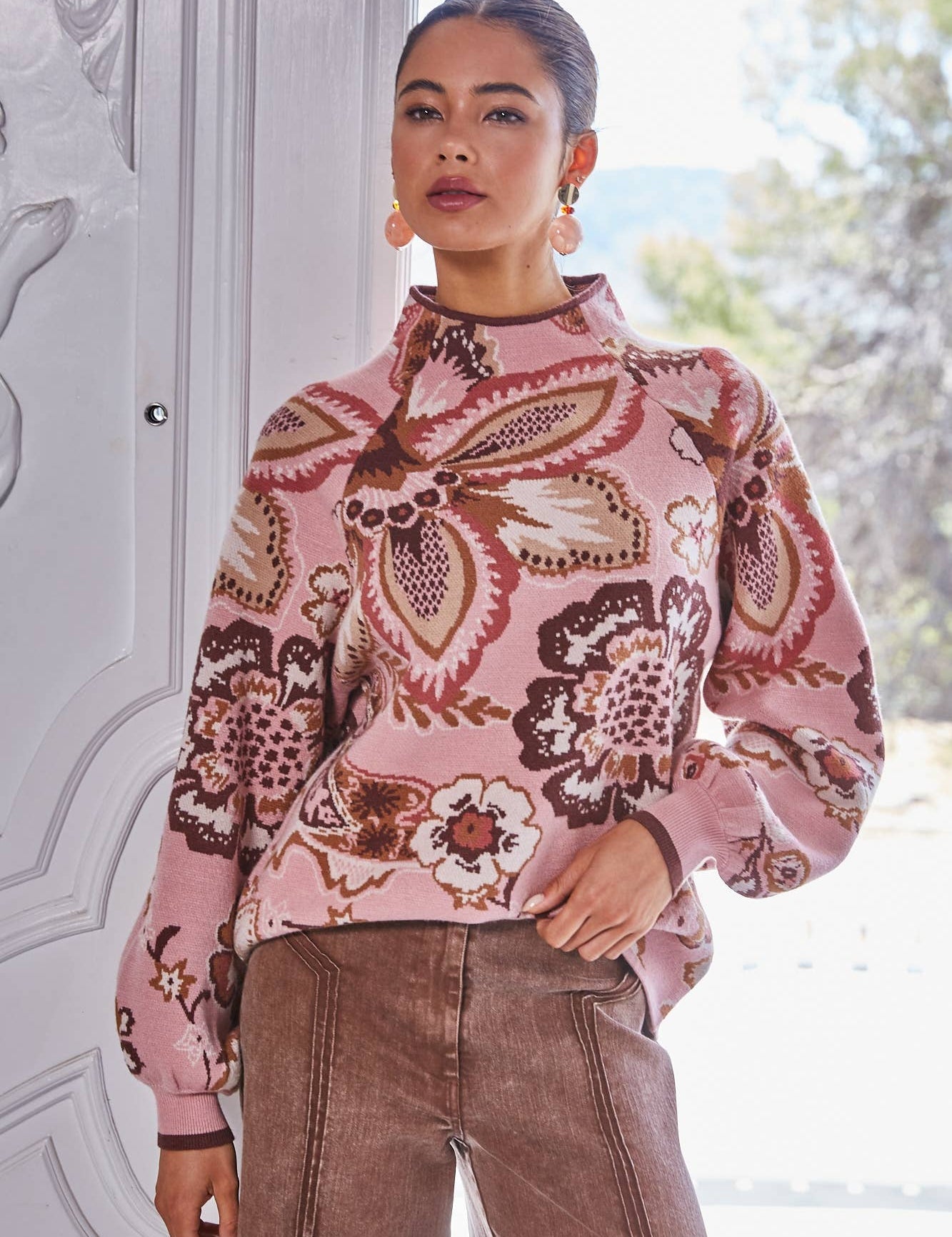 Pink Floral & Paisley Funnel Sweater showing funnel neck