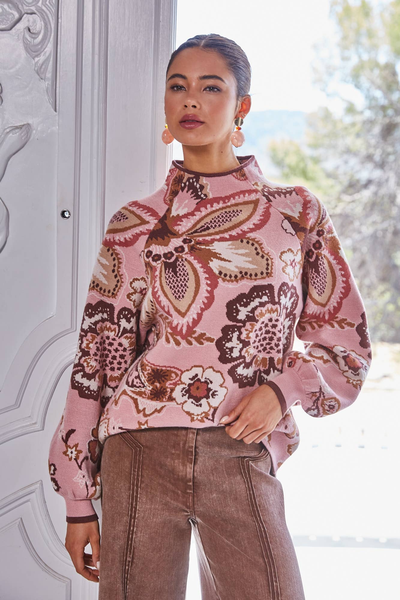 Pink Floral & Paisley Funnel Sweater showing funnel neck