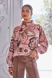 Pink Floral & Paisley Funnel Sweater showing funnel neck