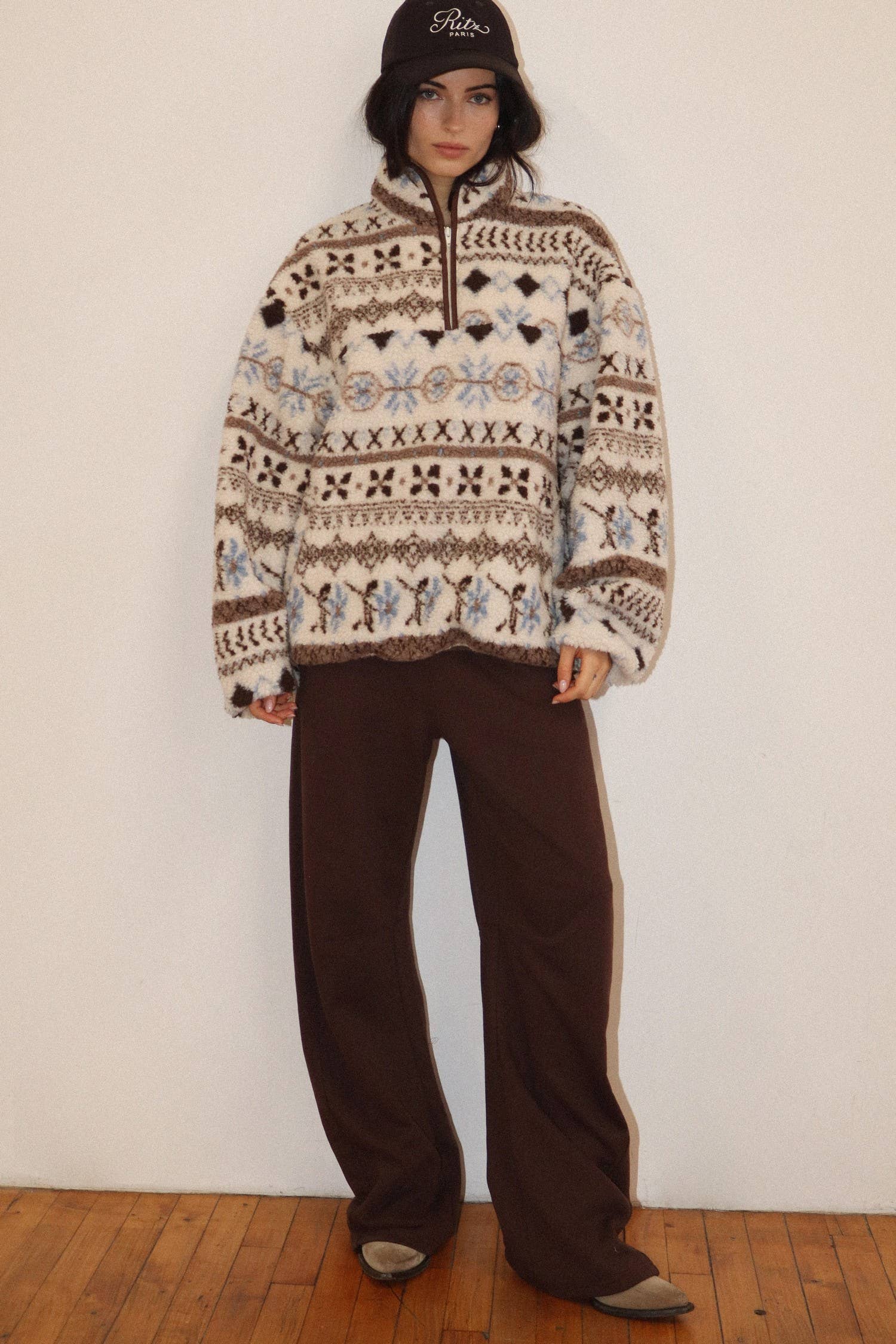 Cream Patterned Fleece Pullover showing elastic cuffs