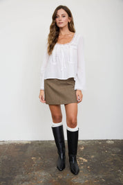 White Lace Trim Long Sleeve Top showing functional buttons down front