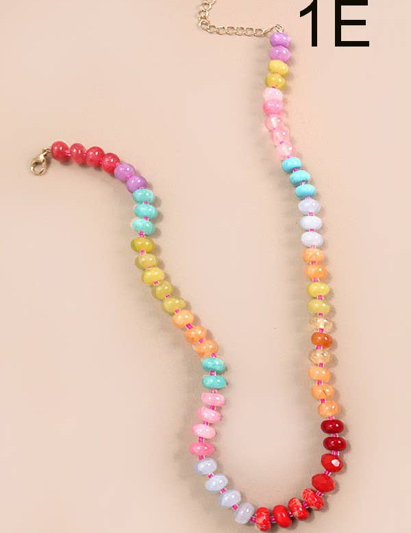 Rainbow Beaded Necklace — color: multicolor rainbow and faceted rondelle beads set in a rainbow gradient