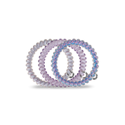 Spiral Hair Coils | Small | Orchid Oasis showing strong grip, no rip spiral hair tie