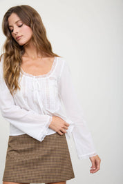 White Lace Trim Long Sleeve Top showing tie detail at the front