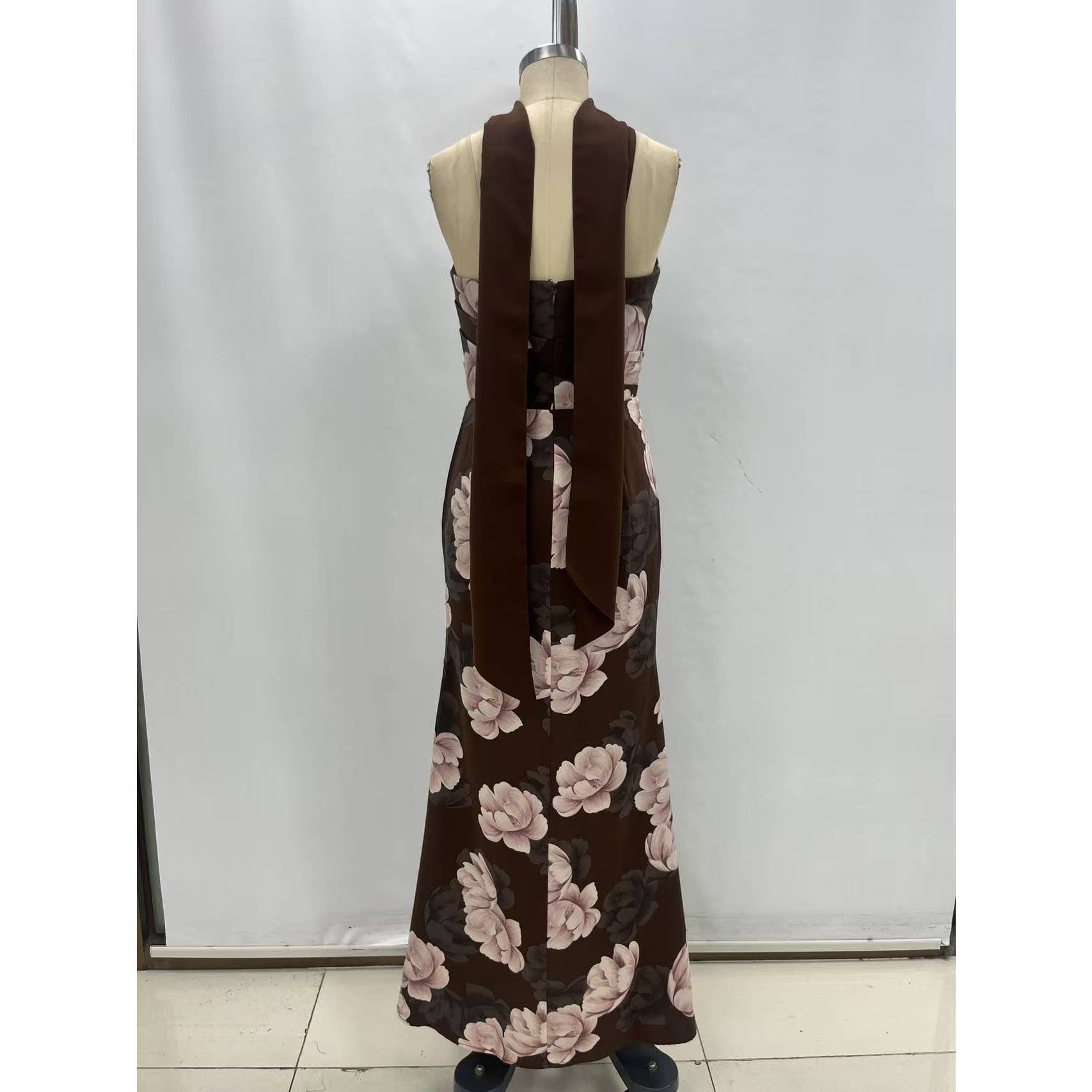 Brown Floral Mermaid Maxi Dress showing narrow cutout across the upper back