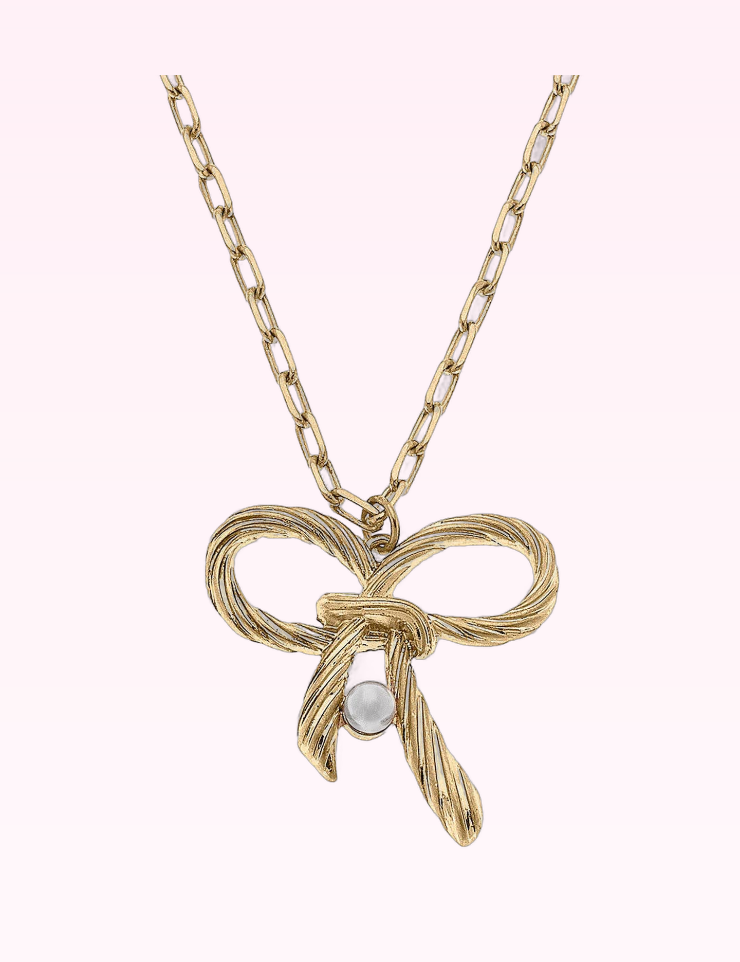 Ninety Nine Boutique super-pale pink accessory product photo: Amy Bow & Pearl Pendant Necklace in Worn Gold (September 30, 2026)