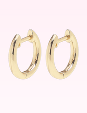 Ninety Nine Boutique super-pale pink accessory product photo: Michelle Classic Huggie Hoop Earrings in Shiny Gold (September 30, 2026)
