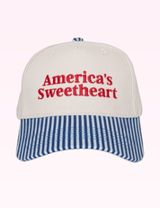 Ninety Nine Boutique super-pale pink accessory product photo: Navy America's Sweetheart Trucker Hat (September 30, 2026)