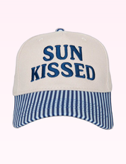 Ninety Nine Boutique super-pale pink accessory product photo: Navy Sunkissed Trucker Hat (September 30, 2026)