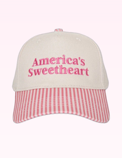 Ninety Nine Boutique super-pale pink accessory product photo: Pink America's Sweetheart Trucker Hat (September 30, 2026)