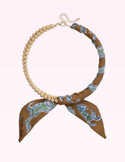 Ninety Nine Boutique super-pale pink accessory product photo: Winnie Ball Bead Scarf Necklace in Brown (September 30, 2026)